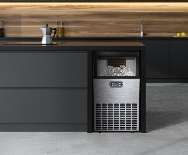 A modern countertop ice maker produces fresh ice in a bright, clean kitchen.