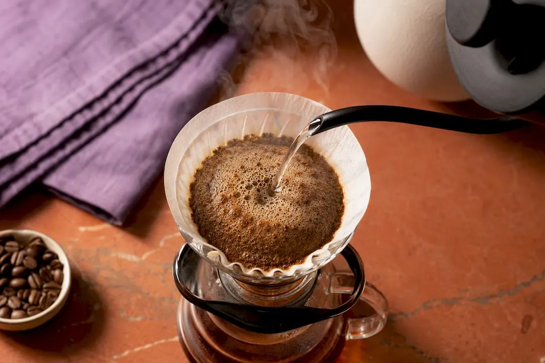 Essential brewing equipment used for preparing the perfect light roast pour-over coffee.