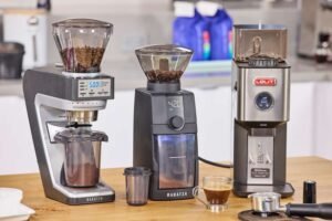 Freshly ground coffee for an espresso machine sits ready in a portafilter.