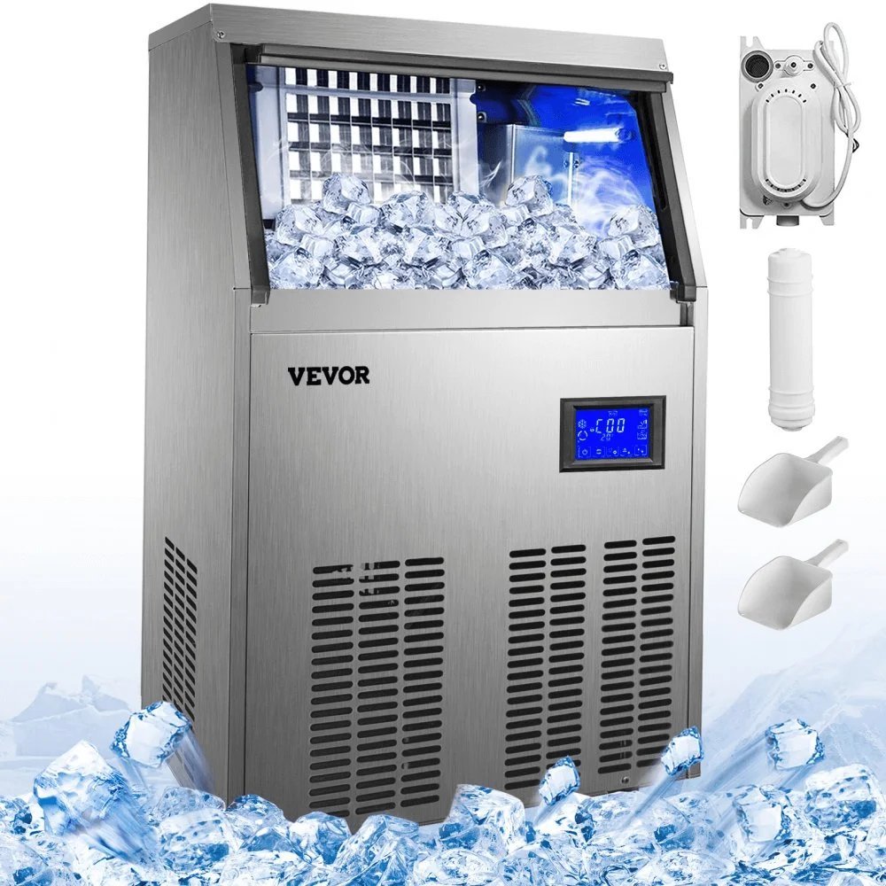 A person scoops fresh ice cubes from the bin of an ice maker machine.