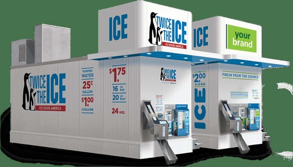A modern commercial ice vending machine located at a busy gas station.