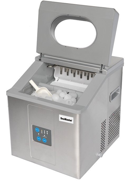 Interior view of an automatic ice maker mechanism inside a freezer compartment.