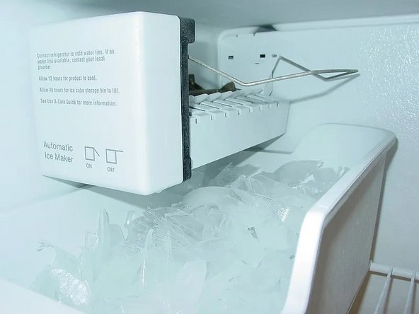 Properly installed refrigerator water supply line showing no kinks or sharp bends.