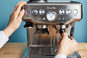 A professional espresso machine and premium coffee grounds ready for brewing rich espresso.