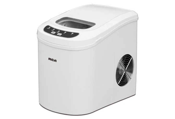 A person reading a manual next to their RCA ice maker.