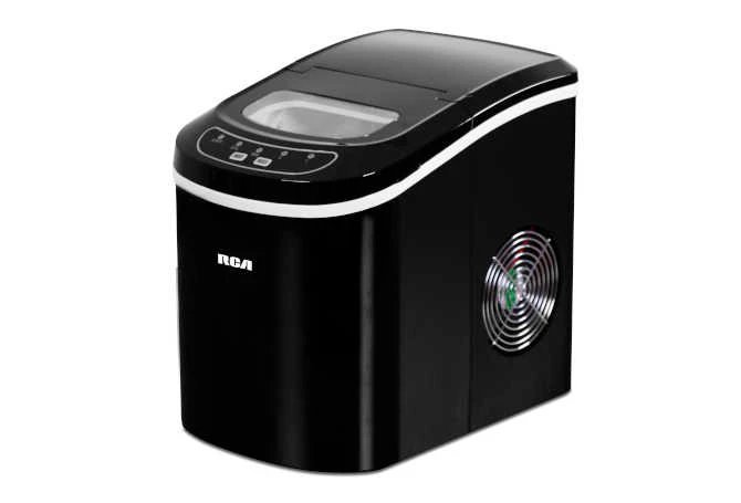 A portable RCA ice maker on a marble countertop ready for use.