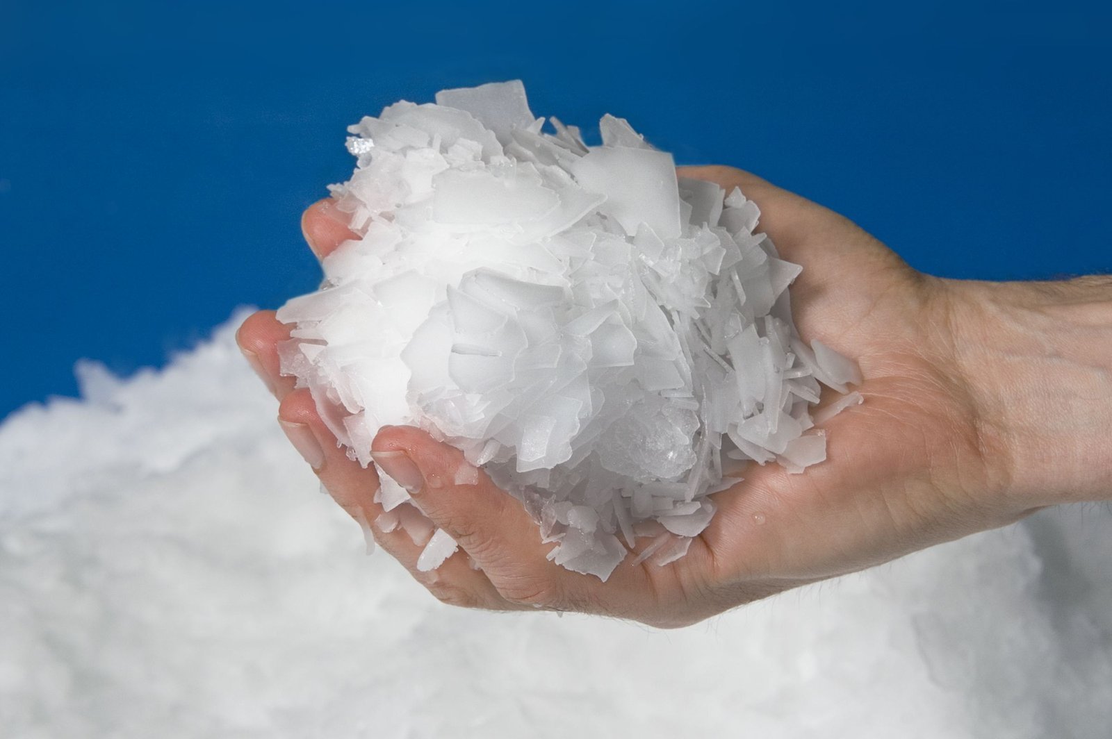 Close up of the auger blade and cylinder wall inside a flake ice machine.