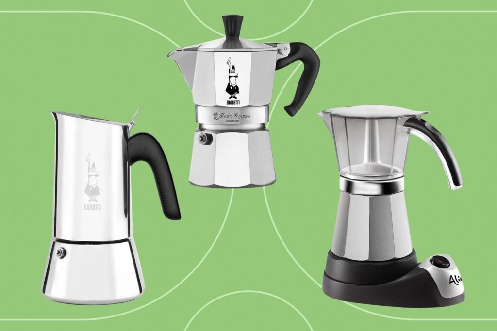 An assortment of premium coffee beans and brewing equipment on a wooden table.