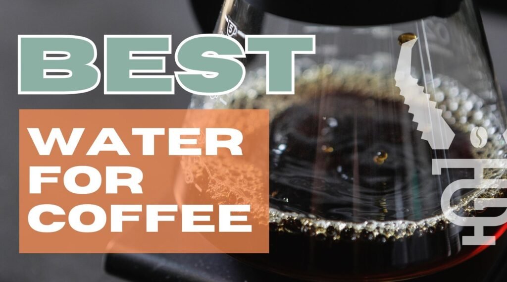 Glass carafe of filtered water beside ceramic drip coffee brewer on oak countertop
