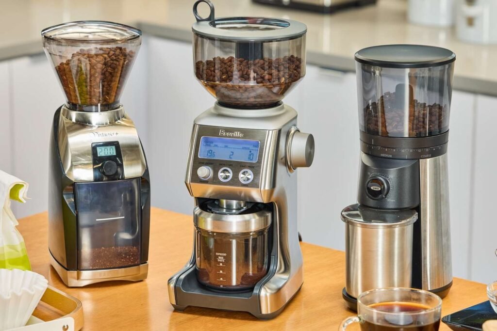 A steaming cup of affordable coffee beside roasted beans on wood.