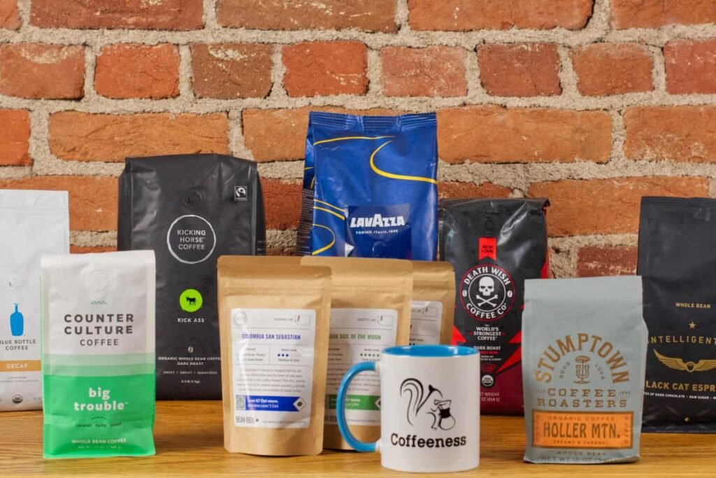 A variety of affordable coffee beans arranged neatly on a modern kitchen counter.